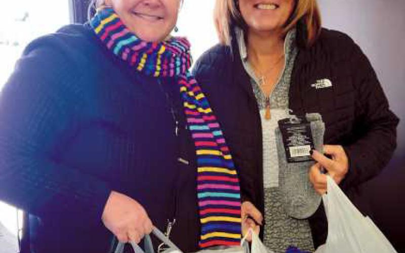 Monclova neighborhood hosts annual Christmas tree lighting, collects donations for Hannah’s Socks