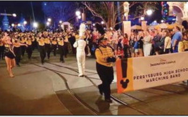 The Perrysburg High School Marching Band performed in a Walt Disney World night parade through the Magic Kingdom in November.