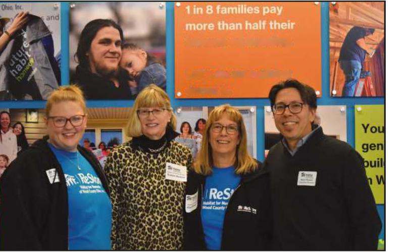 From left: ReStore Manager Robin Swanson, committee members Susan Nelson and Kim Brummel and Executive Director Mark Ohashi.