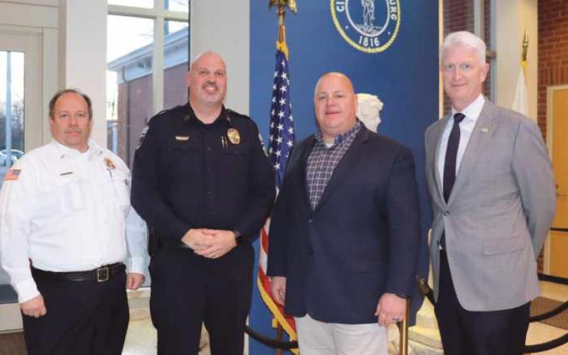 From left: Deputy Fire Chief Tom Granata, Police Chief and Safety Director Patrick Jones, Fire Chief William McCullough and Mayor Tom Mackin at February 21 city council meeting.