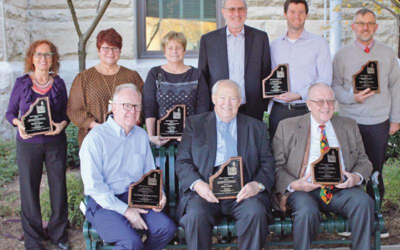Recipients of the 2021 Spirit of Wood County awards are, seated from left, Robert Bettinger, Lyle R. Fletcher Good Citizenship, and Jack Jones and Walt Churchill Jr., industrial and economic development. Back row from left, Beatriz Maya, liberty through law and human freedom; Deb Archambo, education for civic responsibility; Irma Wolf, selfgovernment; Les and Scott Buker, posthumously for Deb Buker, Lyle R. Fletcher Good Citizenship, and Alan Sundermeier, agricultural leadership.