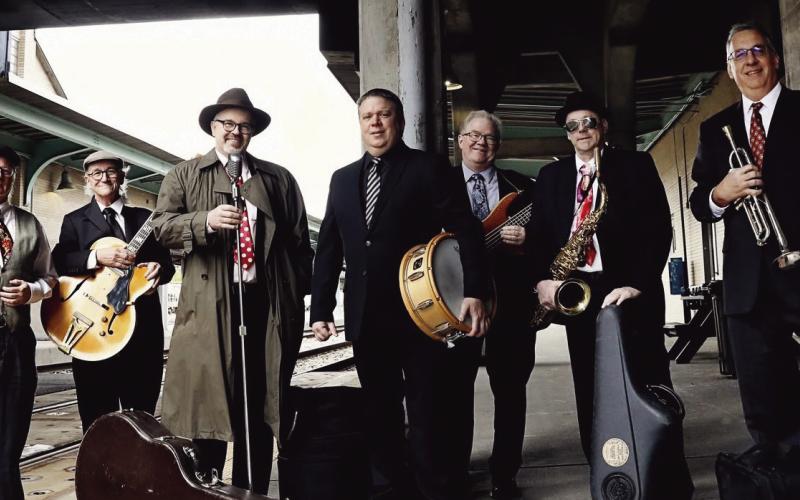 Band members are: Pete Ford, Ken Zuercher, Greg Tye, Travis Knepper, Tom Ritter, Stan George and Vince Krolak.