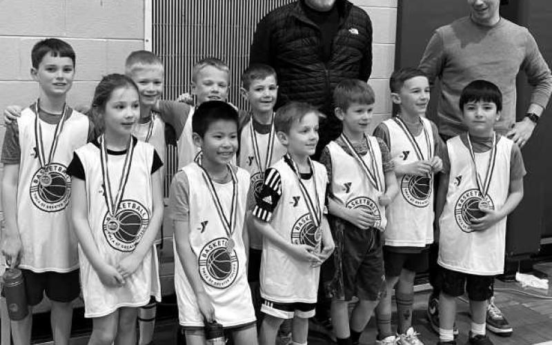 The Pacers basketball team at Fort Meigs YMCA recently went undefeated as they wrapped up their winter season. The team, compromised of 7-and-8-year-olds, is led by Coach Eric Haywood and Coach Tim who helped the Pacers learn to work as a team and improve their skills. Pictured above is the team and coaches, front row, from left: Kaylynn Pirolli, Luke Ng, Thatcher Haywood, AJ McNamee, Hudson Haywood and Elliot Snow. Back row: Luke Konz, Owen Fomich, Emmett Halm and Garret Pleitz.