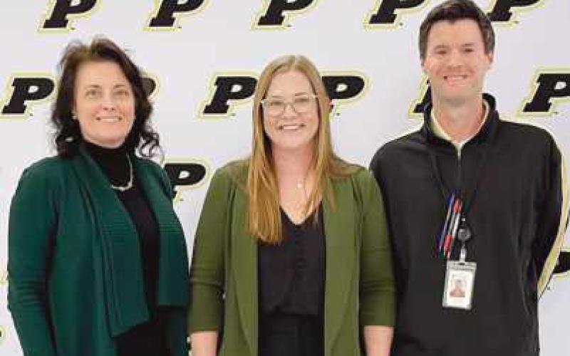 Left to right, board member Laura Meinke, Ohio String Teacher of the Year Betsy Cranston and PJHS Principal Scott Buker.