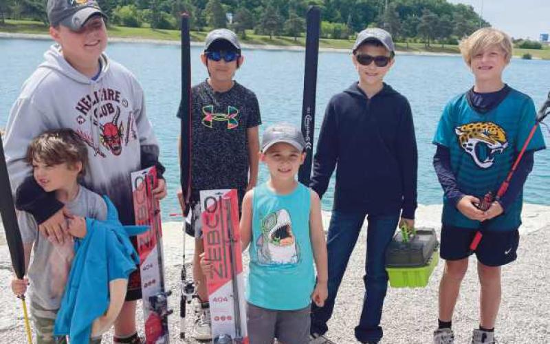 Perrysburg’s annual fishing derby was held June 1 at the large pond at Three Meadows Park for children ages 16 and under. Winners above from left, front row: George Heinze, most perch; Cameron Tucker, tied for longest bass at 12 inches. Back row: Jeffery Heinze, tied for longest bass; Riku Kim, longest catfish at 19.5 inches; Josh Jenson, most variety of fish caught, and Oliver Hummel, longest bluegill at 6.75 inches.
