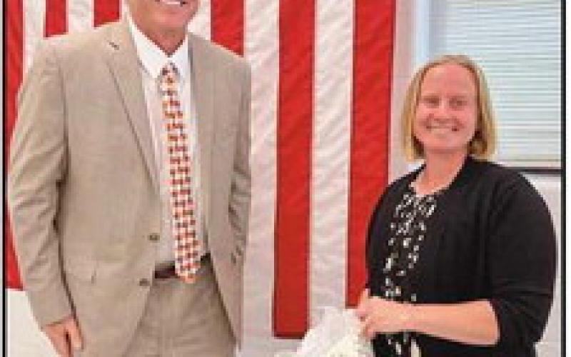 On June 20, the Perrysburg board of education recognized outgoing Perrysburg Education Association president Margaret Bernard, above, right, with Superintendent Tom Hosler, for her service. During her tenure, she faced “unprecedented challenges,” noted Mr. Hosler, adding, “She provided excellent leadership not only to her members but to the entire district.”