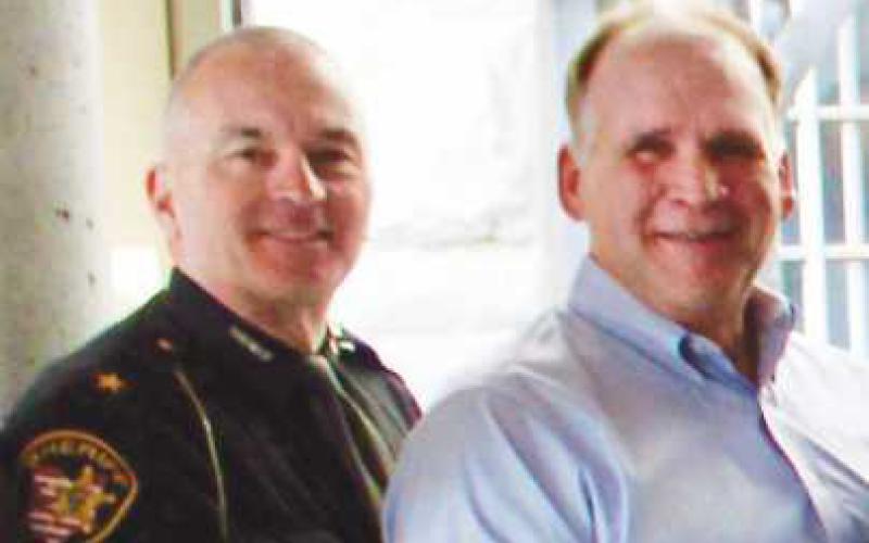 Wood County Sheriff Mark Wasylyshyn, left, nominated Rick Ruffner, owner of O~Deer Diner, for the Lyle R. Fletcher good citizenship award.
