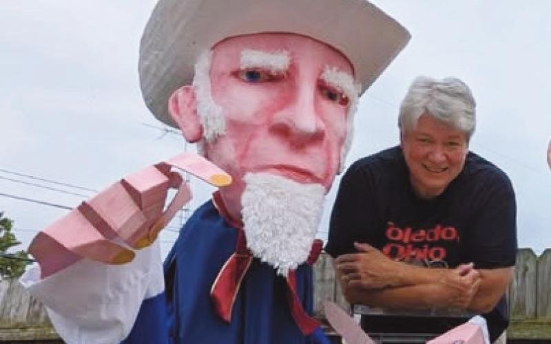 Mary Gaynier and her Uncle Sam parade puppet.