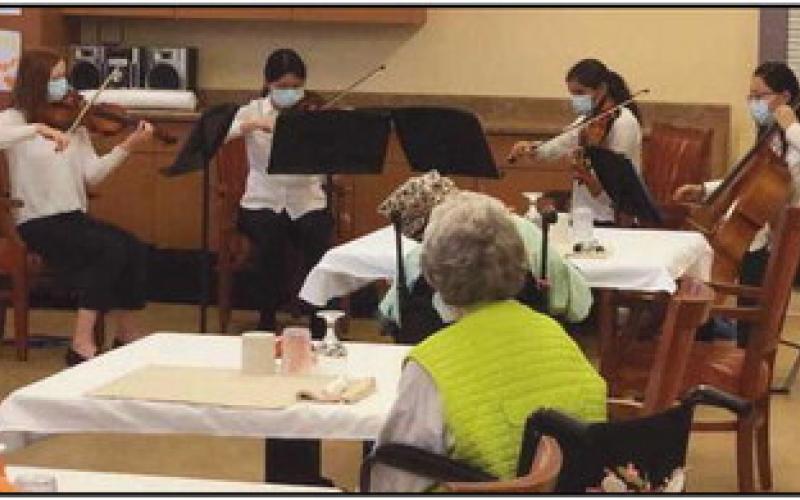 A string quartet, made up of musicians from Perrysburg High School Select Strings, recently performed for the residents at ProMedica Skilled Nursing and Rehabilitation in Perrysburg. The students performed a variety of popular music, including “Colors of the Wind,” “Moondance,” music from “Moana,” “Secret Agent Man,” “Dynamite” and a few Halloween selections. Above, from left, are: Allison Ludwig, violin; Reina Wang, violin; Anna Allen, viola, and Julia Xi, cello.