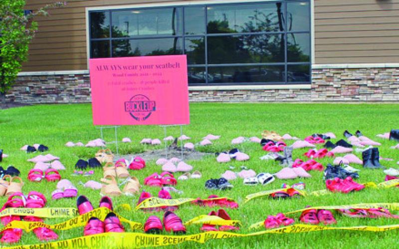 These shoes lining the lawn in front of Mercy Hospital Perrysburg serve as a sober reminder of what can result from a failure to buckle your seat belts. In 2021 and 2022, there were 15 fatal crashes. The red shoes represent the 18 people killed and the others are for the 98 people injured in crashes.