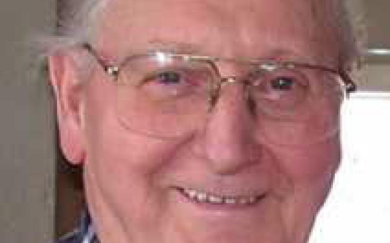 •JOHN T. WHITESCARVER