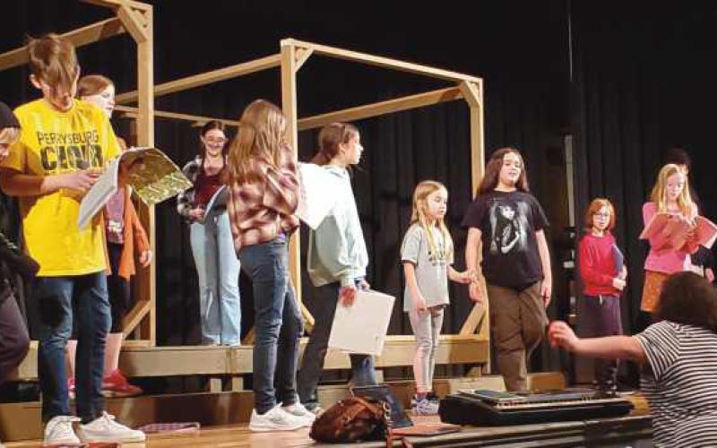 Local children practice for their upcoming performance.