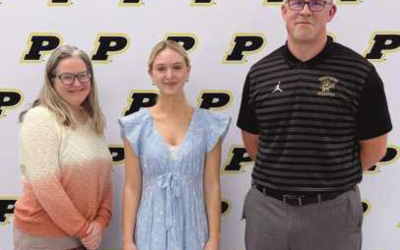 The Board of Education recognized PHS musicians selected for the 2026 OMEA All-State Orchestra: Maya Markham (center), William Hollenbeck and Robbie Zhang (not pictured). This is one of the highest honors for student performers.