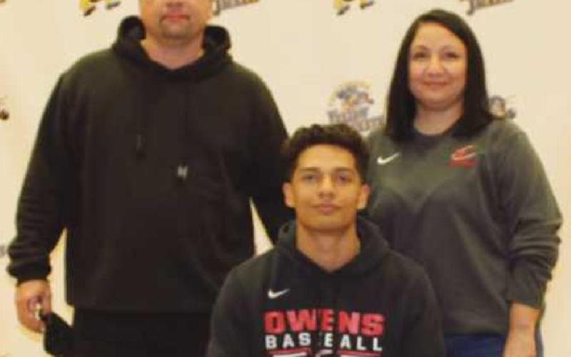 Cam Darrington will play baseball for Owens Community College, where he will study business. With him are his parents Clyde and Melissa.