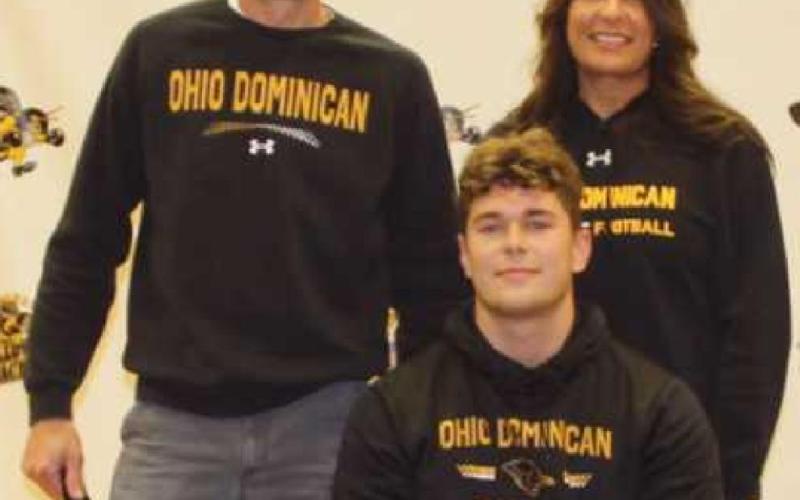 Zane Zaborowski will play football for Ohio Dominican University where he will study business. With him are his parents Jayme and Nicole.
