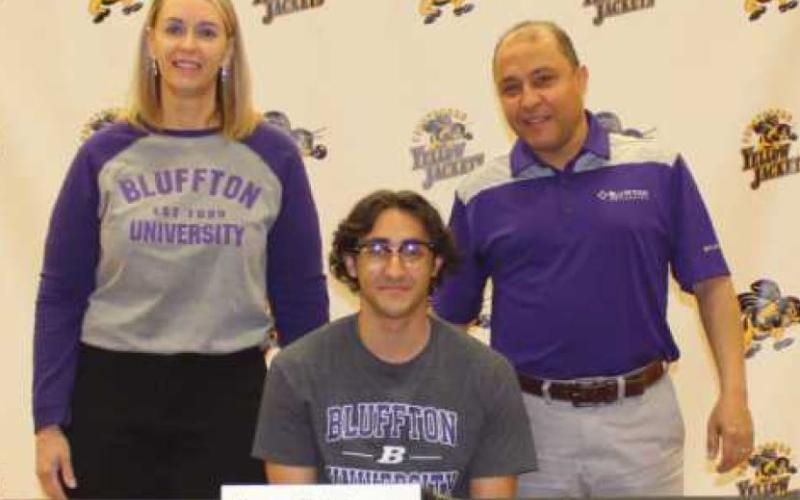 Kareem Shehata will play soccer for Bluffton University where he plans to major in business. Pictured with him are his parents Angie and Mo.