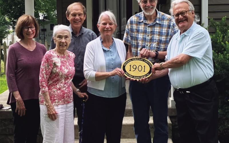Historic Perrysburg Inc. distributed a plaque recently at 338 East Second Street. Homeowners are Bob and Marcia Reynolds. Historic Perrysburg Inc. members pictured with the homeowners are Joanie Graver, Richard Baranowski, Mary Merrick and Dave Kleeberger. Historic Perrysburg distributes the plaques to home owners with a home that is 100 years or older. The application can be found at historicper-See rysburg.org. There is a small processing fee associated with the plaque.