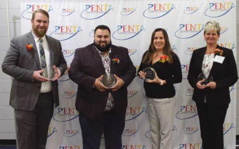 The 2023 recipients of the outstanding alumni award are, from left, Brian Dilley, Austin Flores, Nikki (Thomasson) Depner and Tricia (Rahe) Germann.