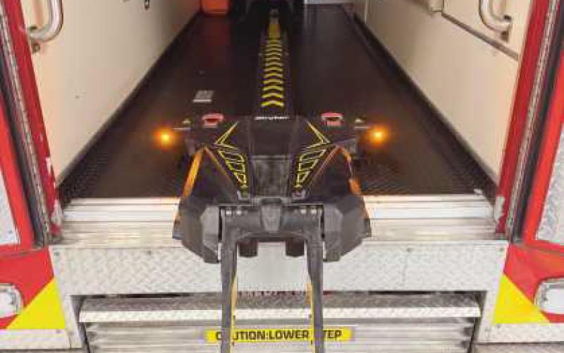 After the patient on the cot is brought over to the ambulance, the fastener system picks it up and mechanically loads them into the patient compartment.