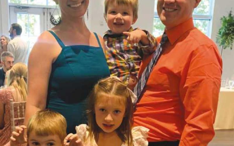 Amanda and Jonathan Smith with their children Lucy, Liam and Abe.