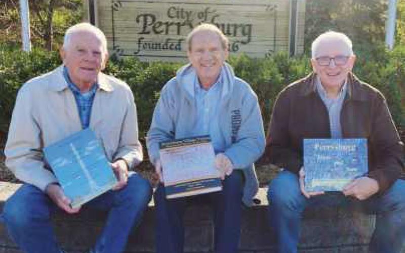 The annual Perrysburg Home for the Holidays parade grand marshal duties will be shared by left, Gary Franks, Richard Baranowski and Mark Weber.