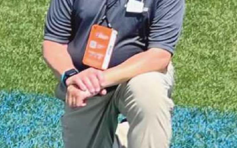 Mr. Swartz on the NCAA logo where the javelin events occurred.