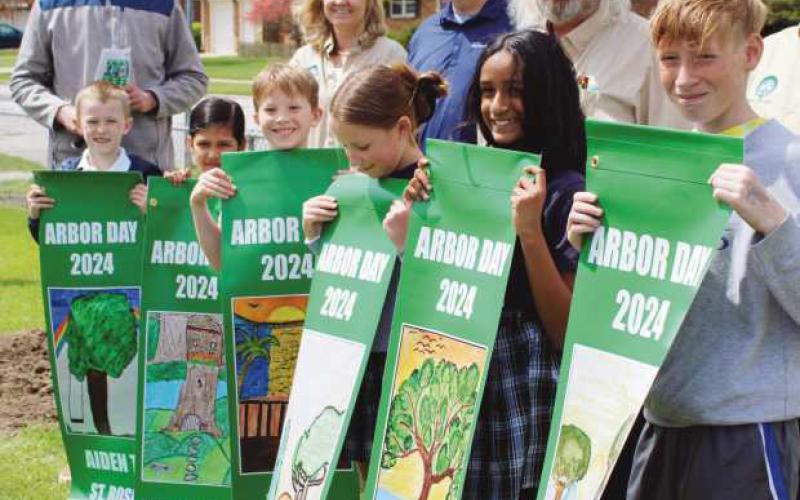 Perrysburg celebrates Arbor Day with tree plantings, banner contest