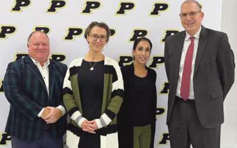 From left: Board Vice President Benington, Executive Director Tiffany Adamski, Director of Advancement Hyfah Hilou and Director of Secondary Teaching and Learning Brent Swartzmiller.