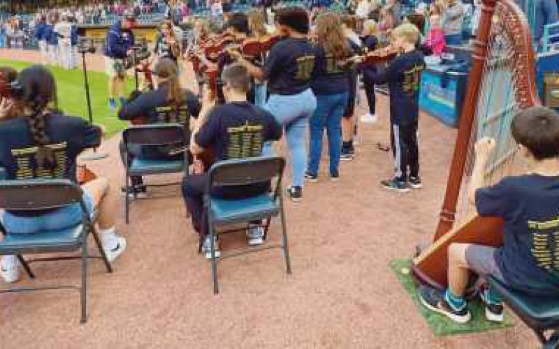 PJHS strings perform at Mud Hens game