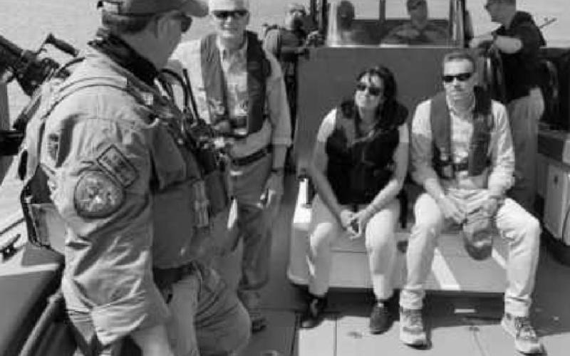Above, Congressman Latta, standing at left, participated in a river ride-along with the Texas Department of Public Safety. Below, he visited the Donna, Texas migrant processing facility and met with Border Patrol agents.