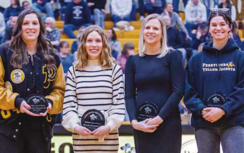 Above, former PHS athletes with plaques at Hall of Fame induction ceremony, from left, are Allison Vallas, Taylor Monheim, Rachel Mathews Heath and Courtney Clody.