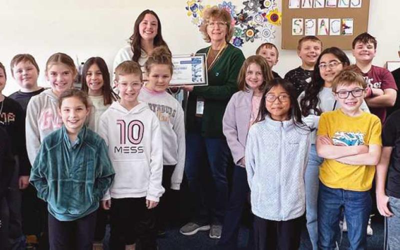 Brooke Stroble, Woodland Elementary STEM teacher, was presented with a $500 WATER grant.