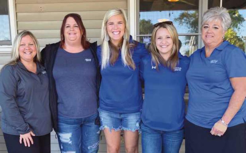 Several GenoaBank employees volunteered to work at the golf outing.