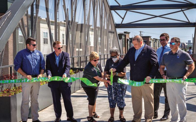 New pedestrian bridge connecting  Glass City, International parks dedicated