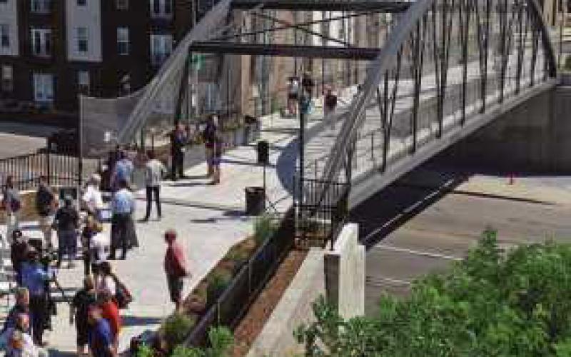New pedestrian bridge connecting  Glass City, International parks dedicated