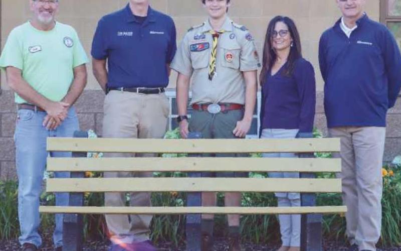 From left, Greg Kuhr, city operations manager; Mayor Tom Mackin; Eagle Scout James Scheff and his mother, Robin Scheff; and Rob Ross, city director of public service.