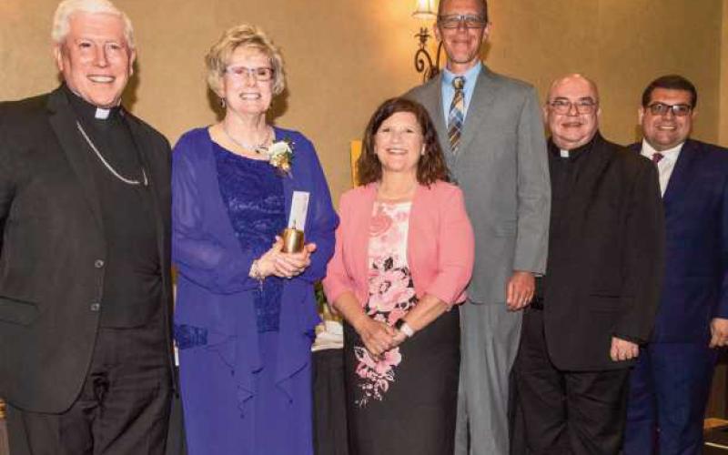St. Rose teacher receives Golden Apple award