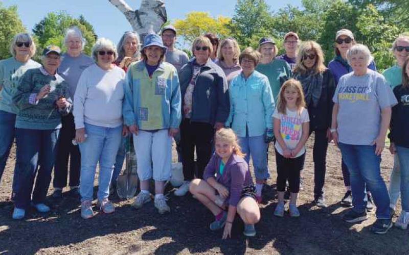 Planting the new garden are: Pat Smith, Myra McClure, Susan Garn, Marilyn Ryder, Carolyn Smith, Sharon Dennis, Todd Grayson, Nancy Wenning, Vicki Gallagher, Rien Gryczewski, Linda Justen, Janet Andes, Michelle Alexander, Colleen McGoldrick, Bella Todak, Lynne Barefoot, Eileen Lyons, Pat Todak, Kate French, Susan French and Barbara French.