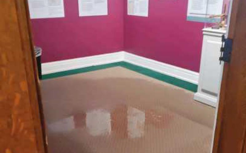 Water soaks this display room floor.
