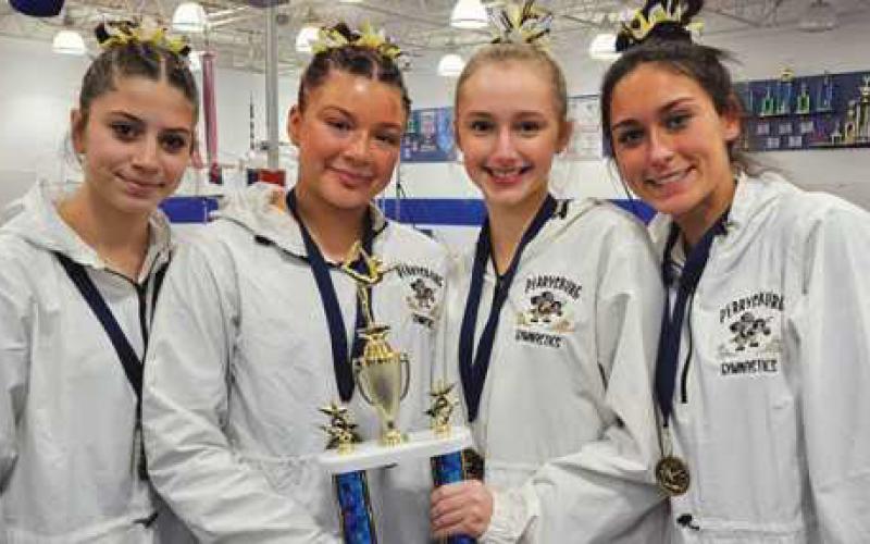 First place finishers, from left to right: Lillian Wood (bars), Kylee Ruiz (vault), Janie Snyder (beam) and Emily Maines (floor).