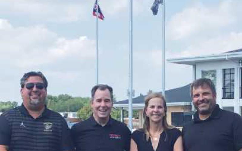 From left: Perrysburg High School Athletic Director Chuck Jaco, Perrysburg Automall President Richard Cronin, Perrysburg Automall Controller Connie Cronin and Perrysburg Schools Director of Development Jeff Abke.