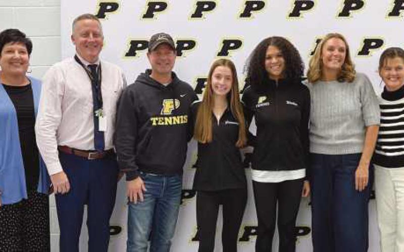 Board Vice President Lori Reffert, PHS Principal Aaron Cookson, Pat Giammarco, Penelope Giammarco, Madison Watkins, Karleen Vrzal and Coach Kelly Carter