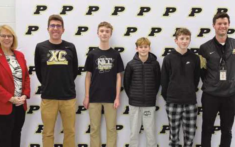 Board Member Sue Larimer, Coach Matt Ferguson, Nolan Szepiela, Michael Butterfield, Bowen Willer and PJHS Principal Scott Buker