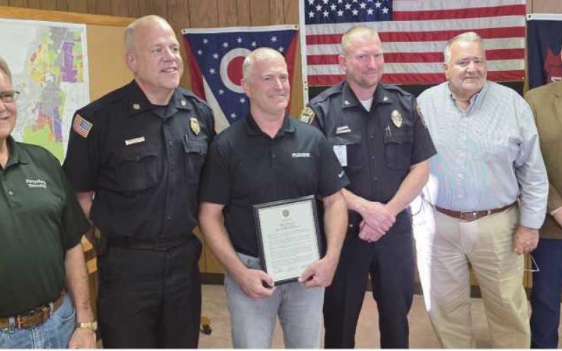 From left: Trustee Gary Britten, Fire Chief Tom Brice, Phil Eisel, Police Chief Matt Gazarek, Trustee Joe Schaller and Trustee Bob Mack.