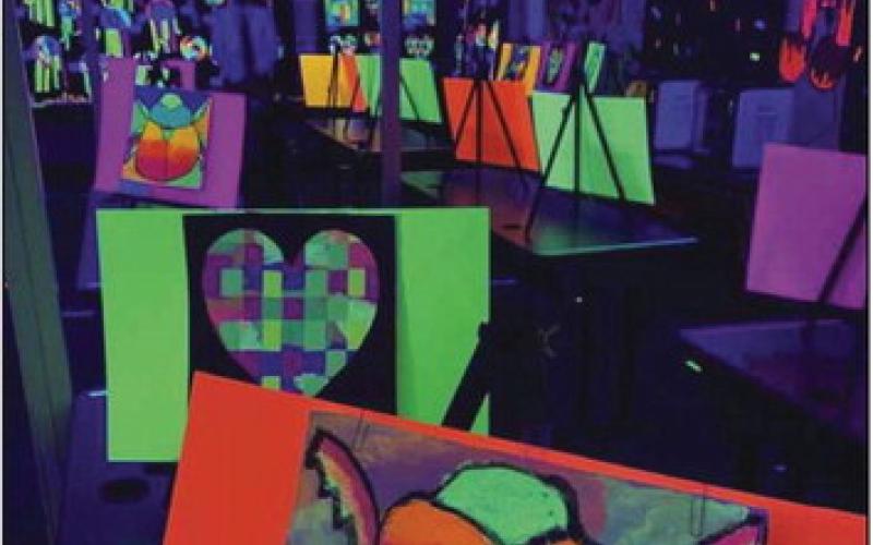 Students displayed their blacklight work at the Fort Meigs Arts Festival this past school year.