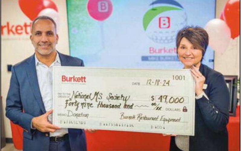 Jameel Burkett (Burkett Restaurant Equipment &amp;amp; Supplies president and CEO) and Julie Leggett (Ohio chapter president of the National MS Society)