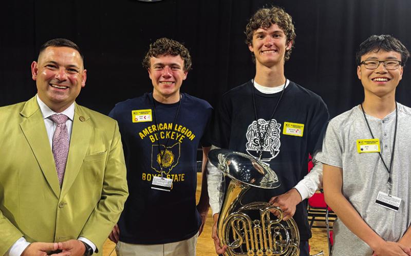 Ghanbari (left) with Buckeye Boys State delegates.