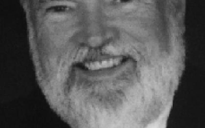 DR. DRAYTON R. JUSTUS JR.