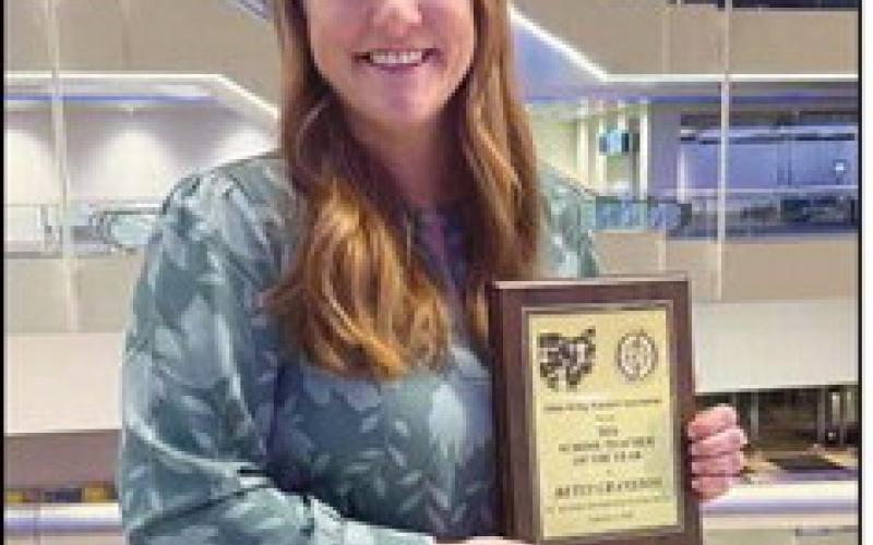 Betsy Cranston with her award.