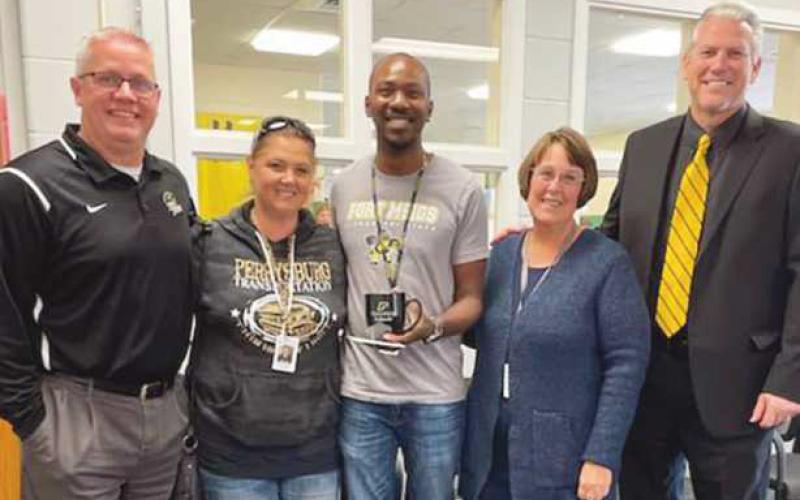 Pictured, from left, are: Marjoe Cooper, principal, Ft. Meigs Elementary School; Kim Schumaker, bus driver; Darryl Edge, dean of students, Ft. Meigs School; Michelle Walland, playground monitor at Ft. Meigs School and bus driver, and Thomas Hosler, superintendent, Perrysburg Schools.